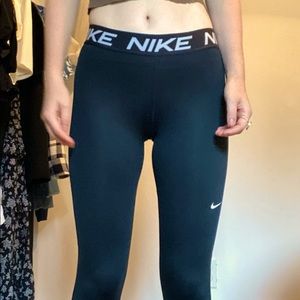 Nike mid rise leggings. They are very comfortable and breathable.